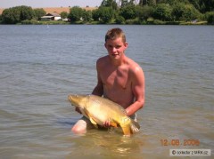 Kliknutím fotografii zvětšíte Slávoš a kapr