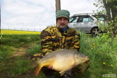 Kliknutím fotografii zvětšíte kapr 68cm a 7,55kg