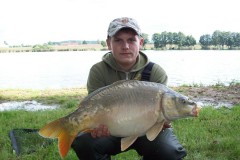 Kliknutím fotografii zvětšíte kapr 66cm a 7,20kg