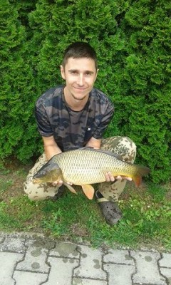 Kliknutím fotografii zvětšíte Kapr 63 cm